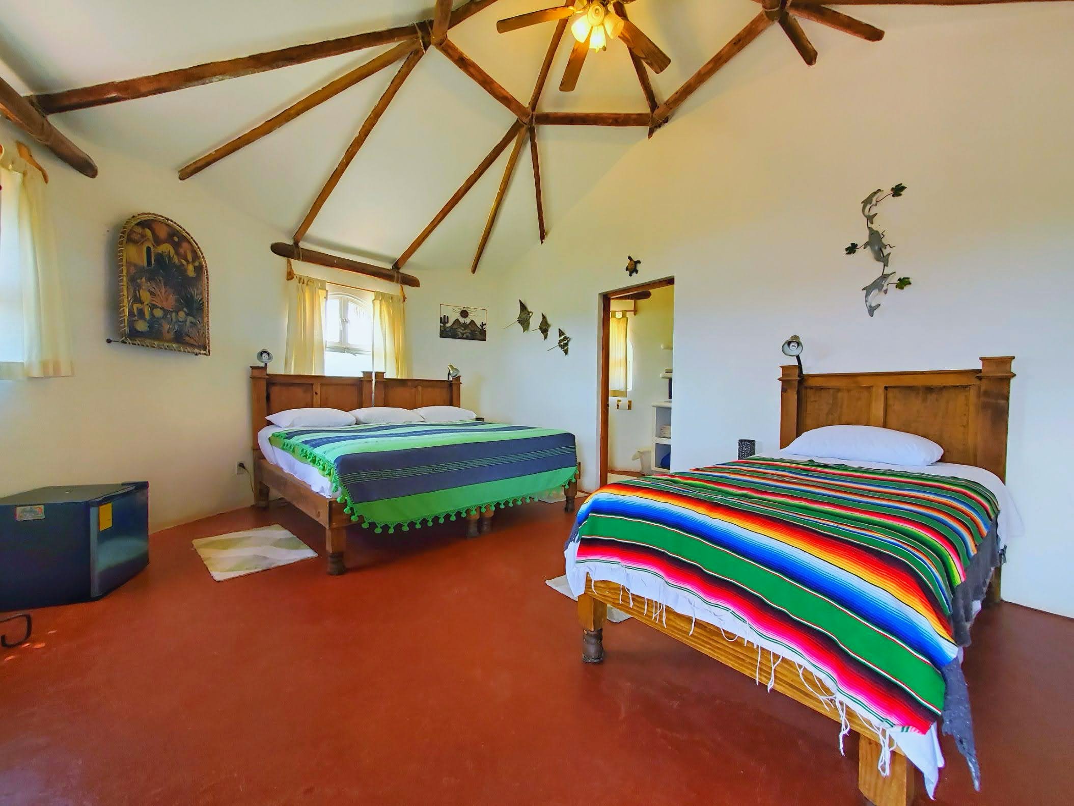 Casita interior with bed and seating